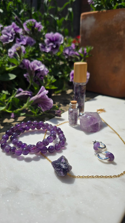 amethyst necklace, amethyst earrings and amethyst bracelet with crystal healing gifts for emotional healing and calm.