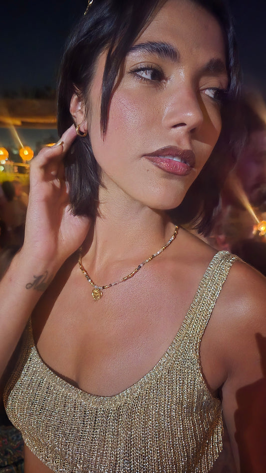 Tourmaline beaded necklace with gold eye heart pendant