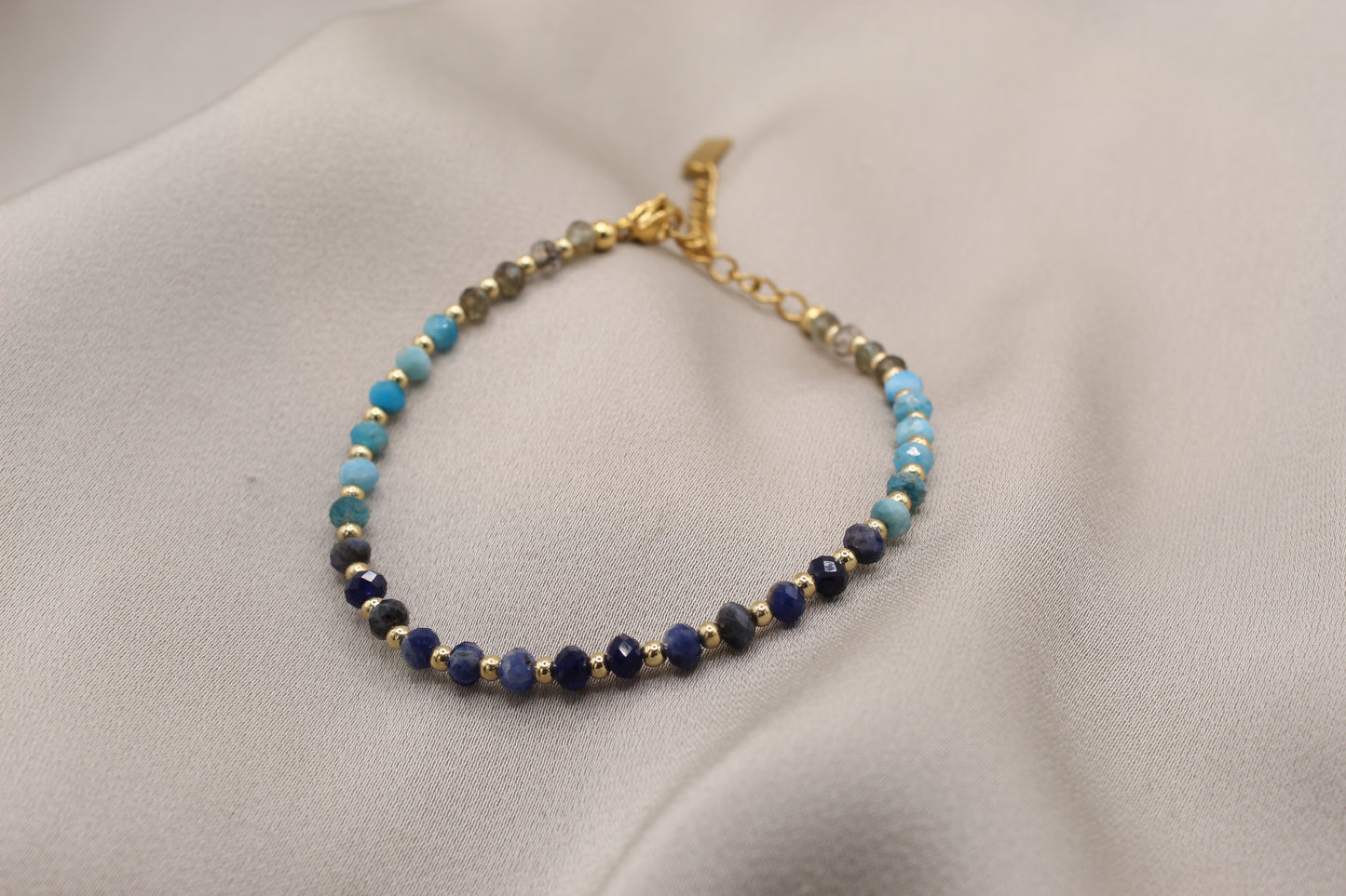 Faceted kyanite bracelet with gold clasp
