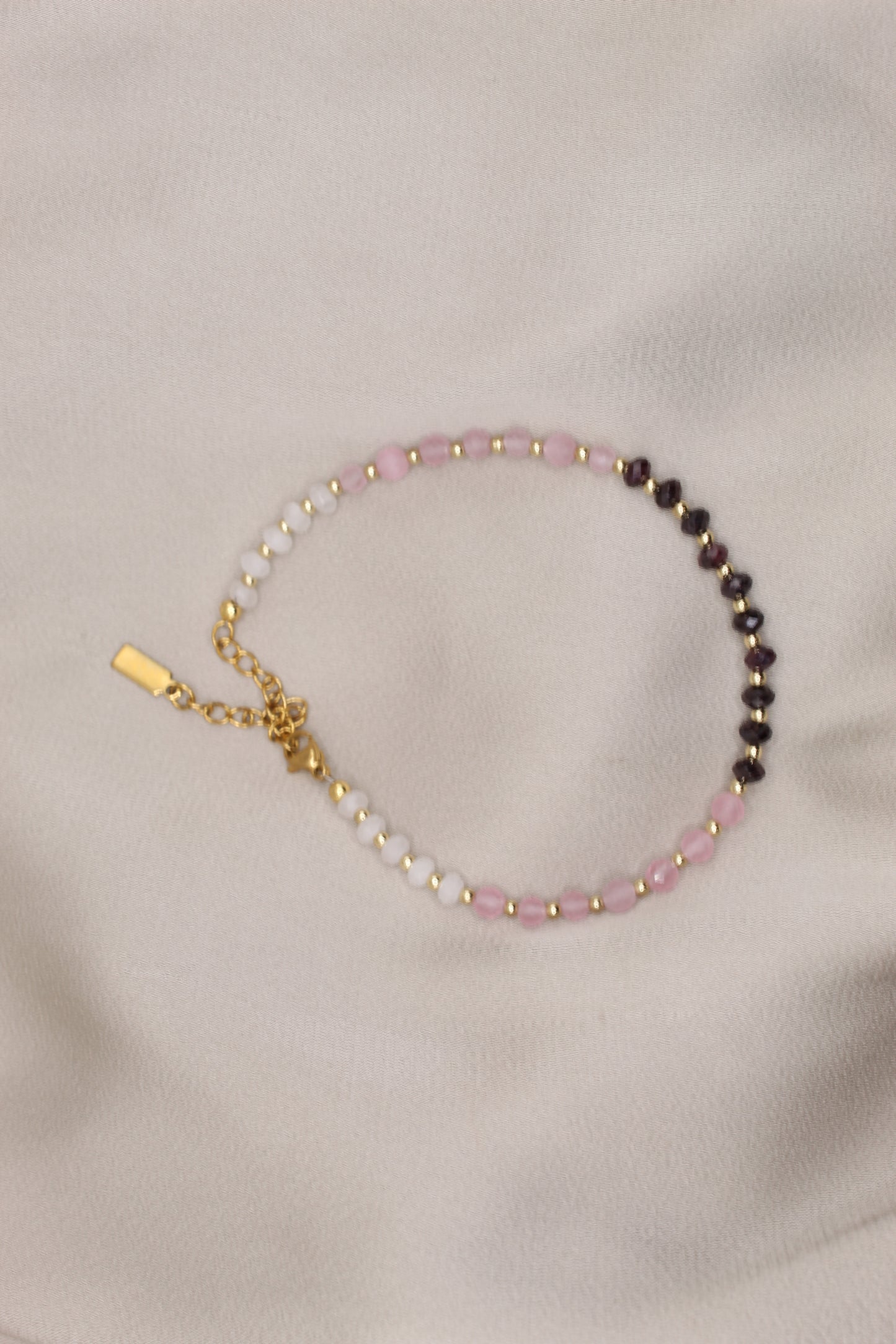 Faceted garnet bracelet with gold clasp