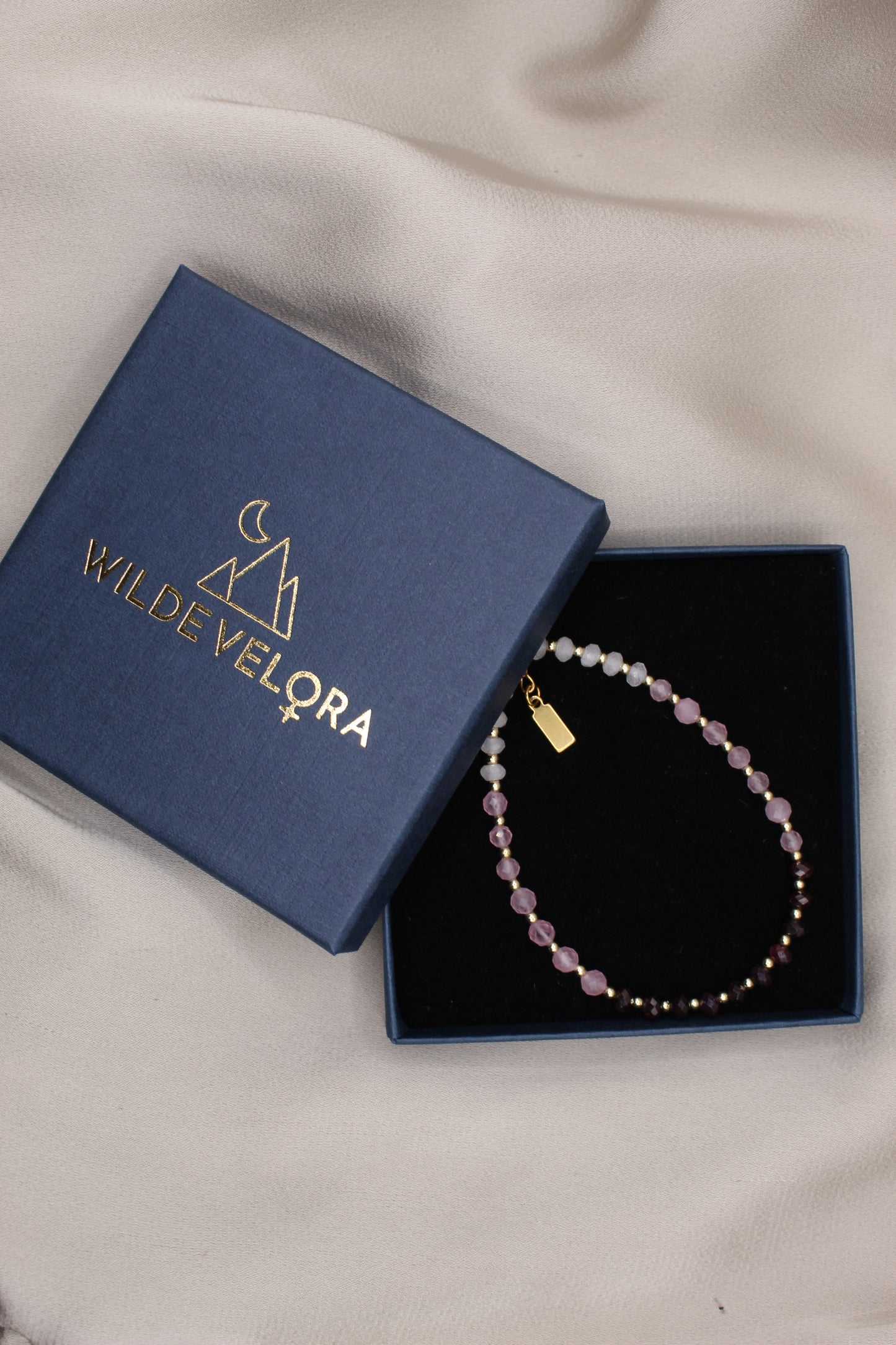 Faceted garnet bracelet with gold clasp