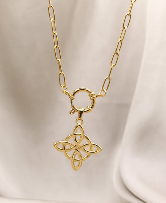 Gold chain with knot pendant